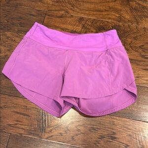 Lululemon Athletica purple speed up shorts. Size 4